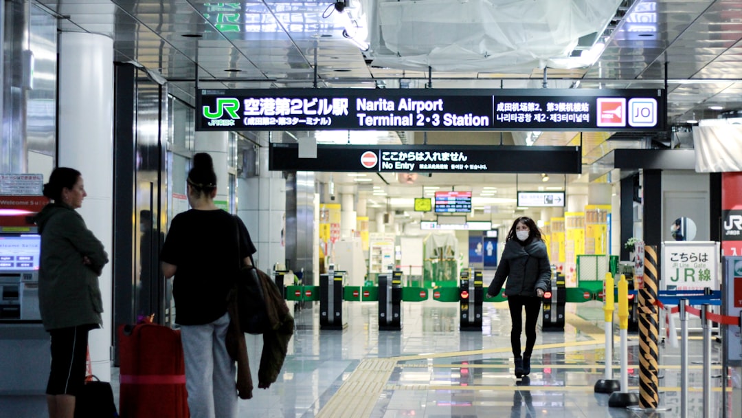 Traveler arriving in Tokyo for Visit Japan Web guide